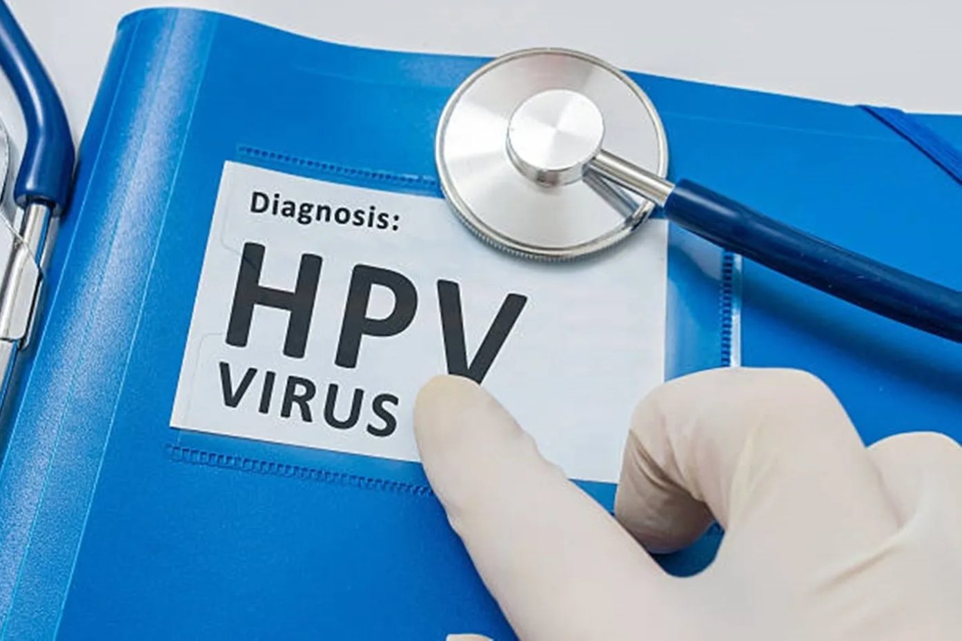 A person is holding up a card that says " diagnosis : hpv virus ".